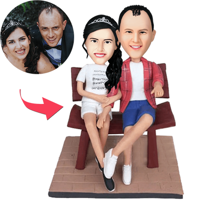 Personalised 'Couple in the Chair' bobblehead with engraved name on base, polymer clay figurine of a seated couple – custom couple bobblehead and personalised anniversary gift