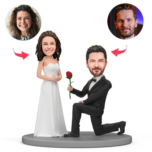 Personalised kneel-on-one-knee proposal couple bobblehead in polymer clay with engraved text — groom kneeling to propose to bride, handcrafted engagement keepsake