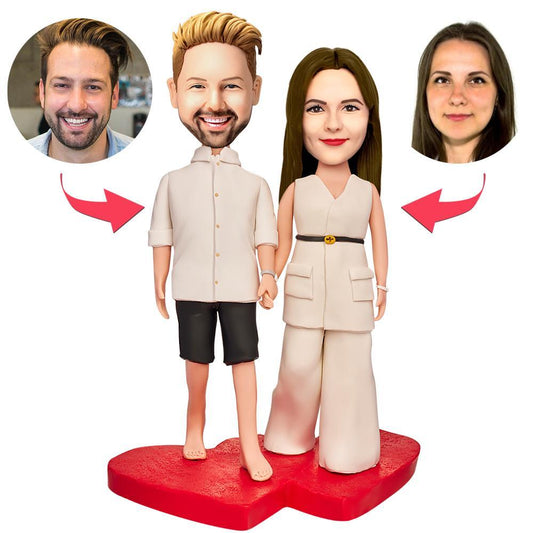 Romantic personalised couple bobbleheads with engraved text on the base — handcrafted polymer clay figurines with customised heads to match photos, ideal wedding or anniversary keepsake