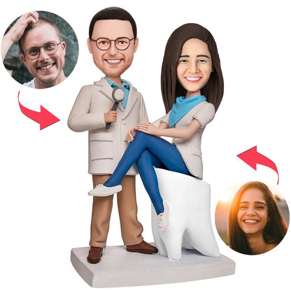 Personalised dentist couples bobbleheads in polymer clay with engraved text on the base, custom sculpted heads to match photos — perfect personalised dental gift, wedding or anniversary keepsake