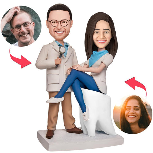 Personalised dentist couples bobbleheads in polymer clay with engraved text on the base, custom sculpted heads to match photos — perfect personalised dental gift, wedding or anniversary keepsake
