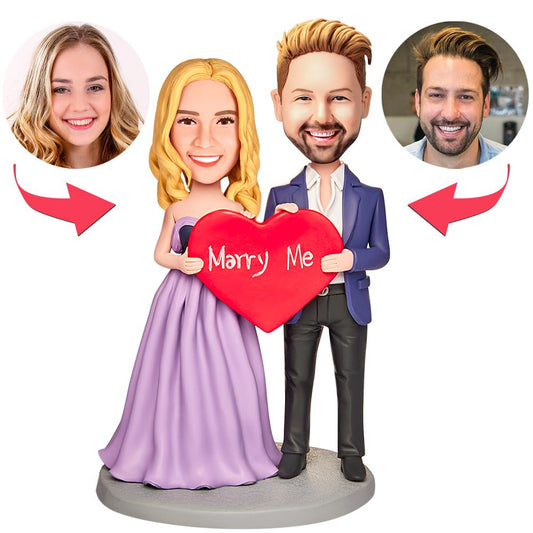 Personalised 'Marry Me' polymer clay bobblehead with customised head and engraved base, ideal custom engraved proposal and wedding gift