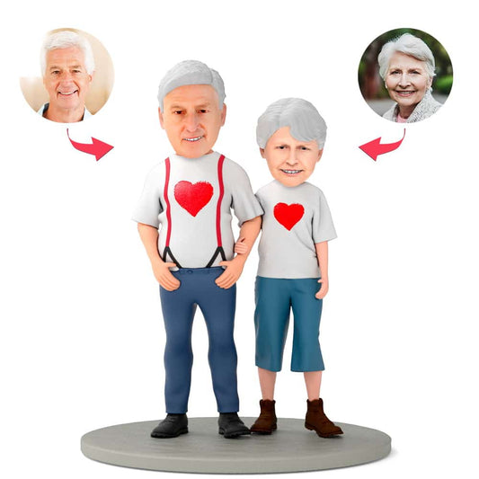 Personalised Valentine’s bobblehead for parents – handcrafted polymer clay couple figurine with custom head sculpted from your photo and engraved message on the base, ideal gift for mum and dad
