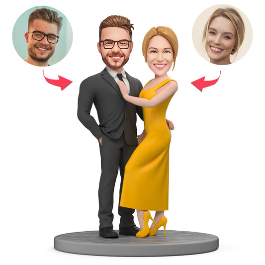 Black Suit & Yellow Dress personalised bobblehead couple — handcrafted polymer clay figures with personalised heads and engraved text on base, perfect Valentine’s gift