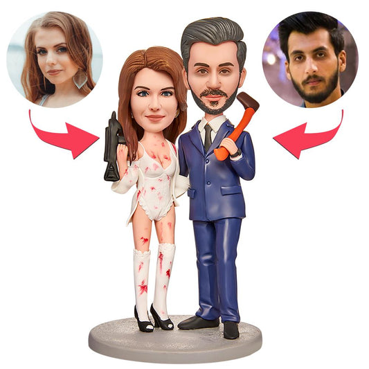 Halloween Horrible Couple personalised bobblehead in hand-finished polymer clay — horror-costume couple with customised heads and engraved text on the base