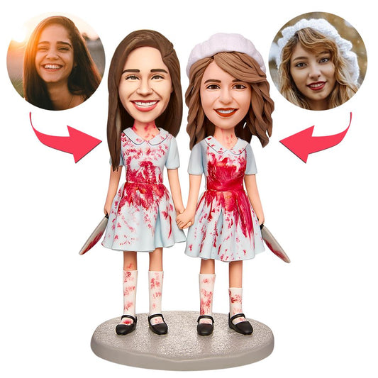 Personalised Halloween twins holding hands bobblehead in polymer clay, custom heads made from photos with engraved base — personalised Halloween bobbleheads spooky keepsake