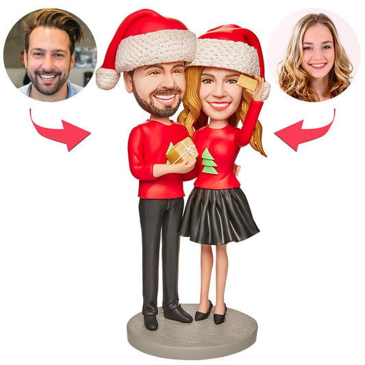 Personalised Christmas couples bobblehead — polymer clay figurine with customised photo heads and engraved base; perfect custom couples bobblehead gift ideal for Australia and the UK