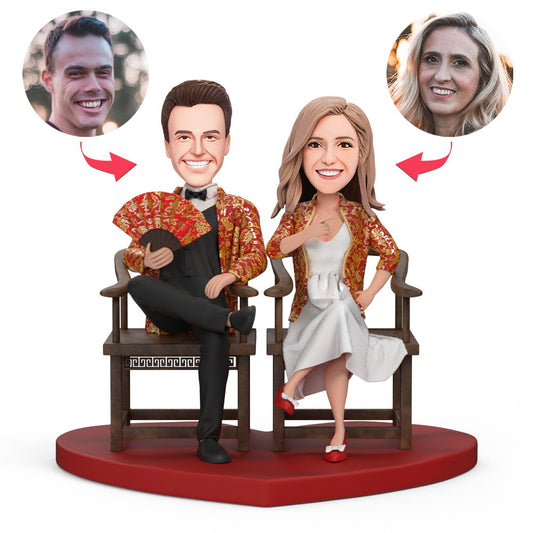Personalised couples bobblehead in traditional Chinese garments, handcrafted polymer clay figurine with engraved text on base — custom head likeness wedding keepsake