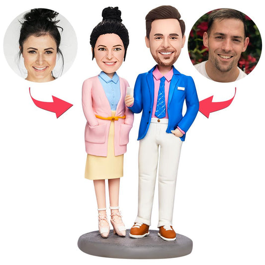Valentine's personalised couple bobblehead in polymer clay — photo-matched custom heads with engraved text on the base, perfect personalised gift for an anniversary or Valentine’s