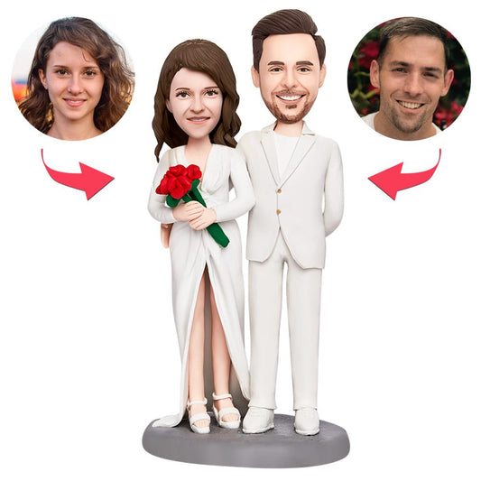 Valentine's personalised couple bobblehead in white – front view of polymer clay handcrafted figure with engraved text on the base, customisable heads; ideal personalised Valentine's gift for couples