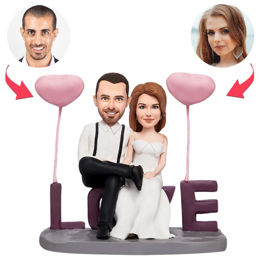 Valentine's personalised 'Sitting in LOVE' custom bobblehead couple — polymer clay figurine with engraved base text, ideal personalised gift for couples in the UK and Australia
