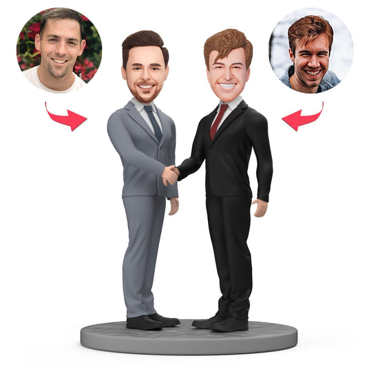 Personalised polymer clay bobblehead of two business partners shaking hands, customised heads — ideal personalised corporate gift and desk ornament