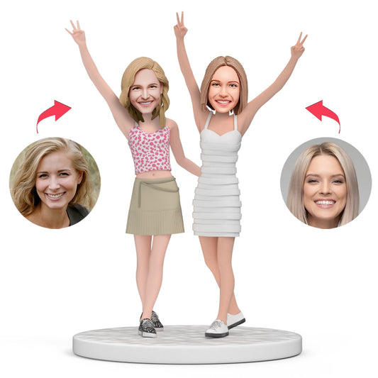 Personalised LGBT lesbian couple bobblehead in cheering pose, handcrafted polymer clay with engraved base text — ideal anniversary, wedding or Pride gift