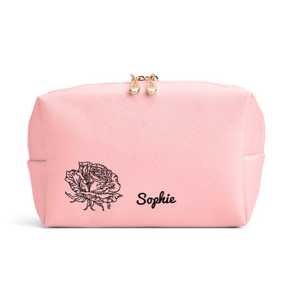 Interior view of the personalised leather cosmetic pouch showing roomy lining and organised space for skincare, brushes and small accessories