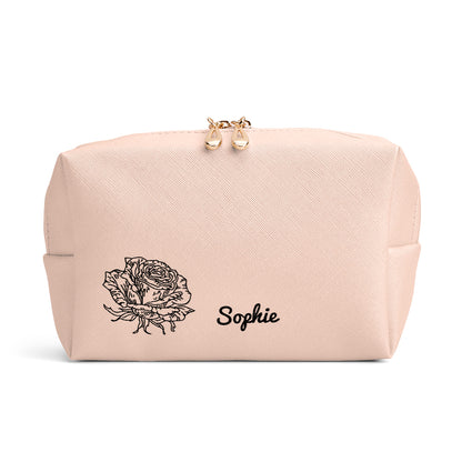 Detailed shot of secure zip closure and neat stitching on the personalised leather make-up pouch, built to withstand travel