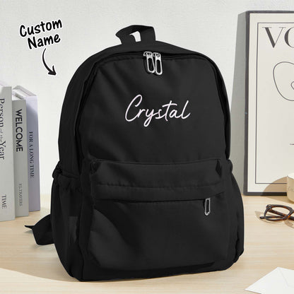 Close up of personalised name embroidery on durable canvas backpack highlighting stitch detail, custom name kids school bag
