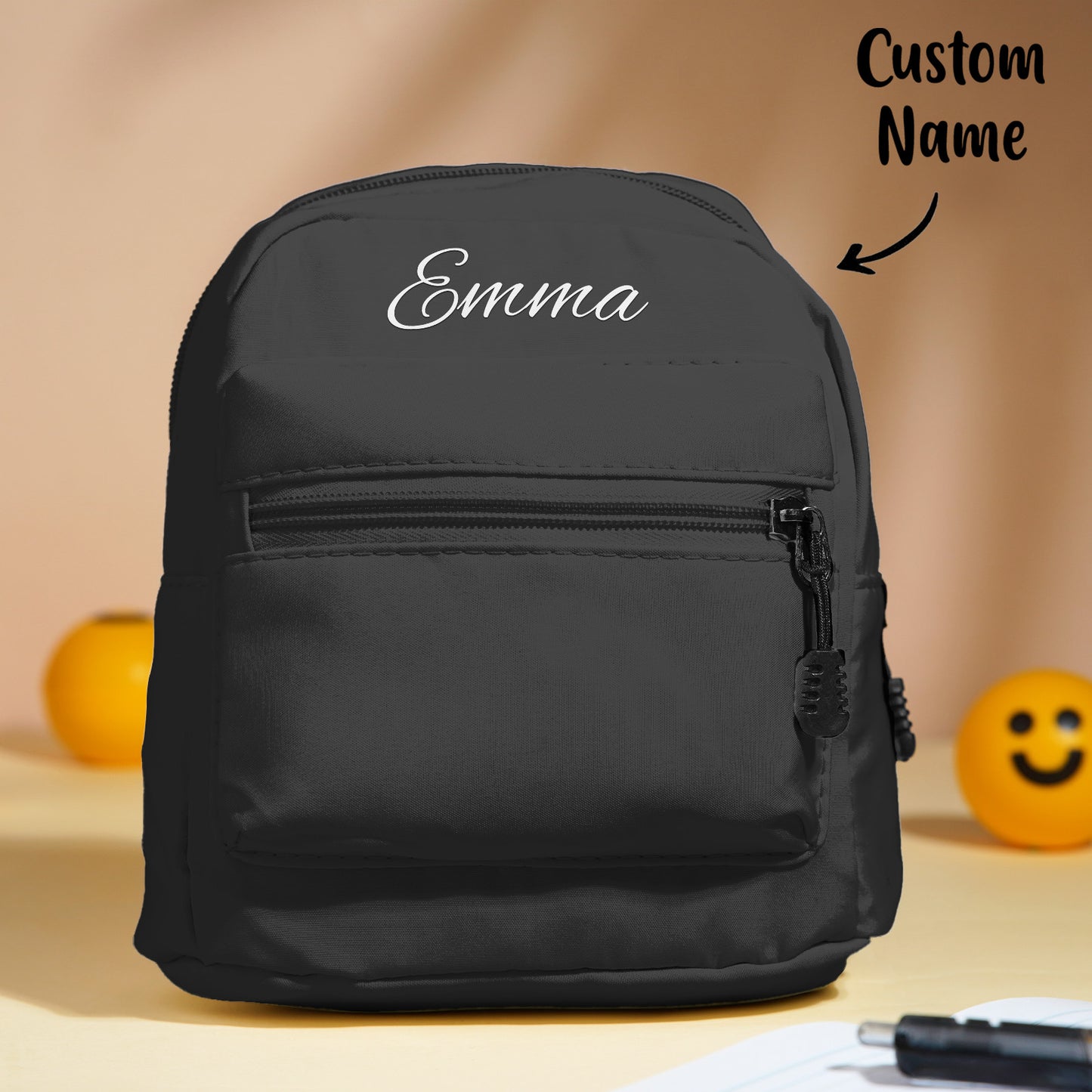Personalised mini backpack front view with embroidered name — small polyester school bag for kids, perfect back-to-school gift