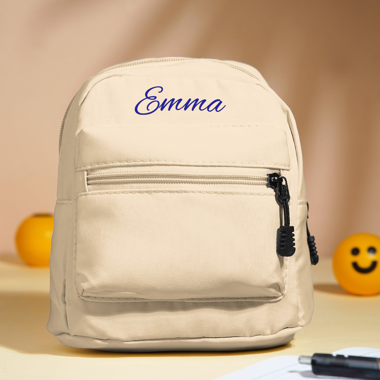 Angled view of personalised mini backpack showing embroidered name and adjustable straps — durable preschool bag for girls and boys