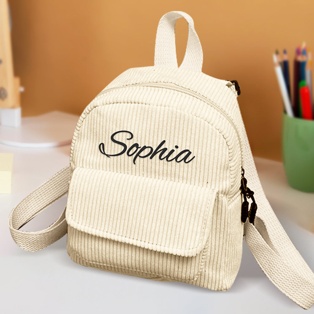 Collection of personalised mini corduroy backpacks in assorted colours – perfect personalised gifts for children