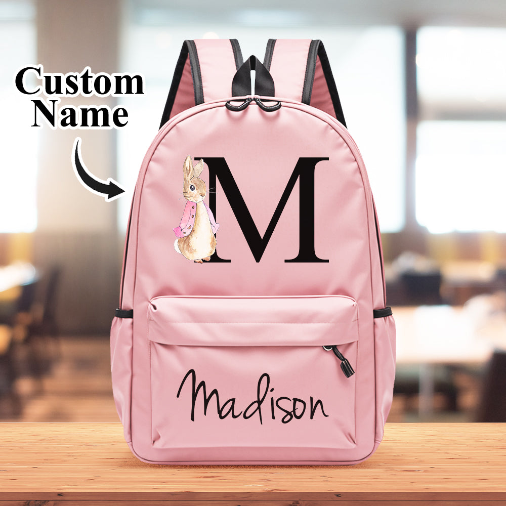 Example of personalised name and initial monogram on a rabbit print kids backpack – stylish customisation options for girls and boys, perfect birthday gift