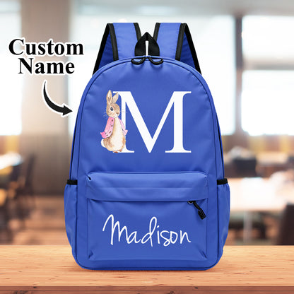 Size comparison of personalised kids backpack with ruler – compact 25cm x 35cm x 10cm dimensions ideal for preschool and primary school