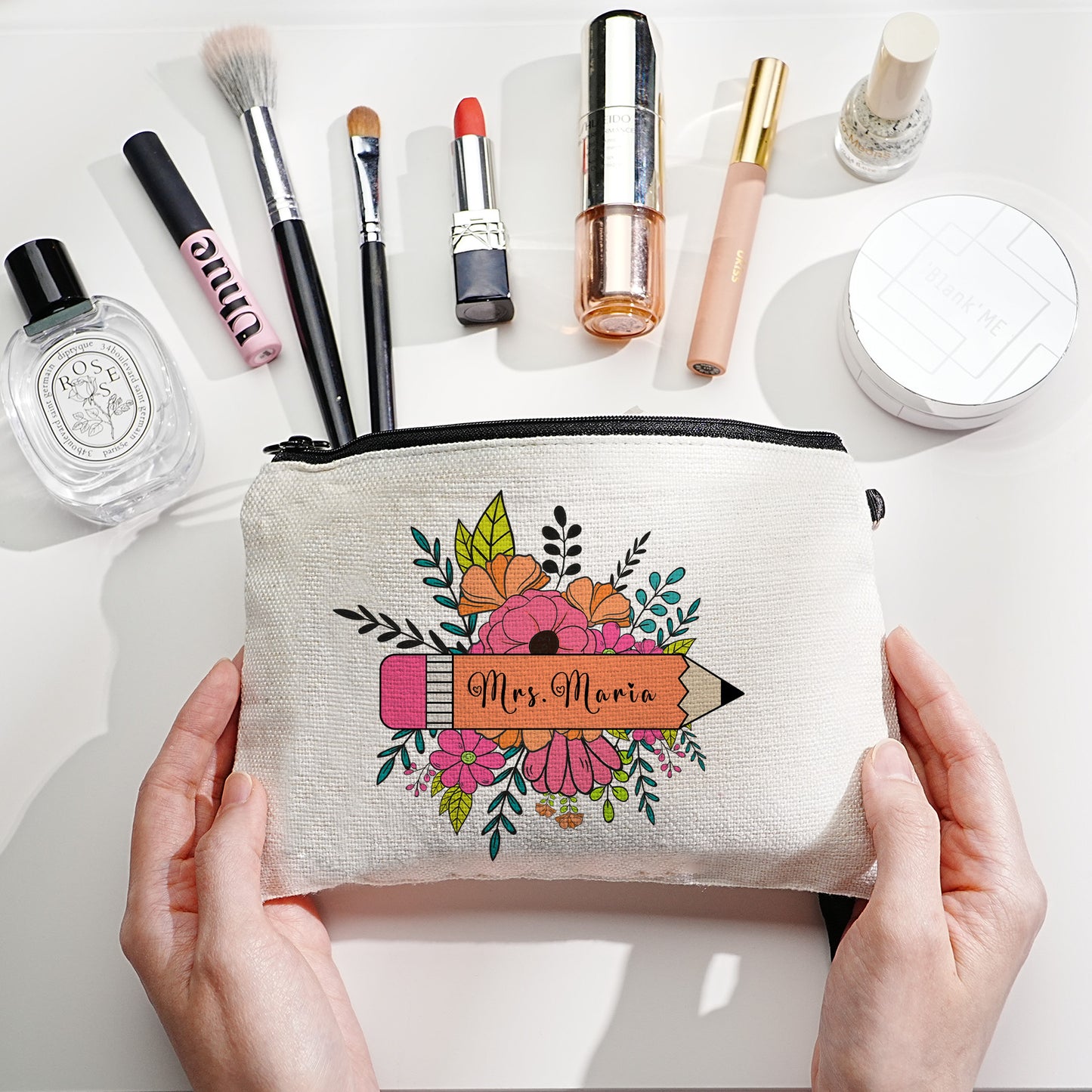 Durable canvas personalised pouch displayed on desk as thoughtful gift for colleagues and mentors
