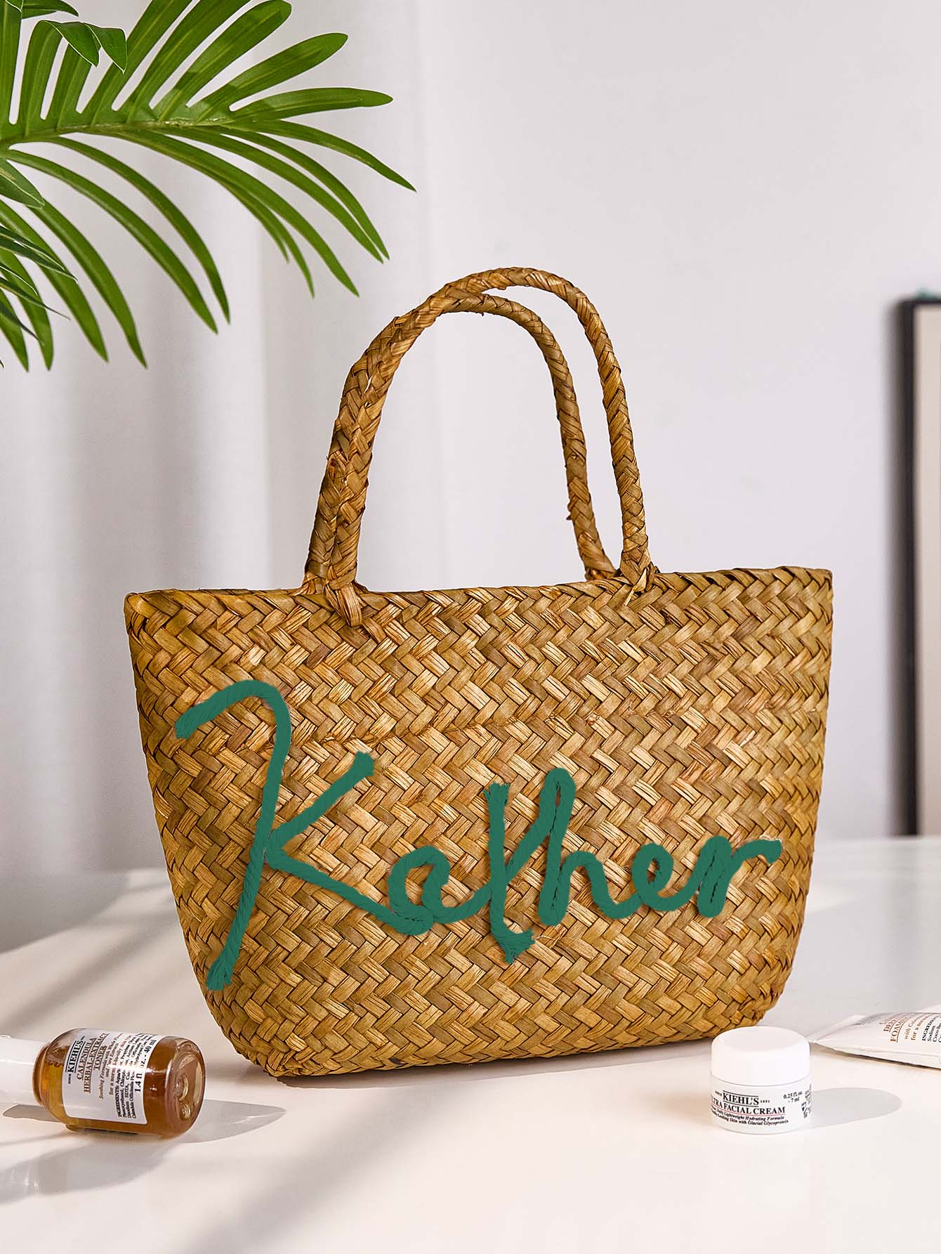 Base and finish detail of handmade straw bucket bag showing sturdy construction and neat edging for everyday durability