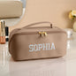Interior view of personalised embroidered makeup bag showing organised compartments and easy-to-clean waterproof lining