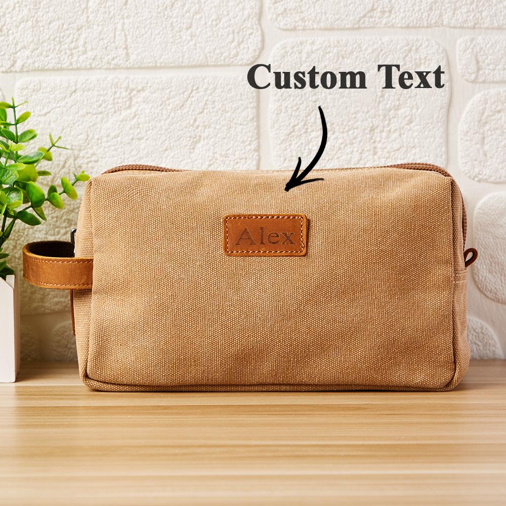 Personalised engraved canvas toiletry bag showing front monogram — elegant wedding gift and travel wash bag (25 x 14 x 11 cm)