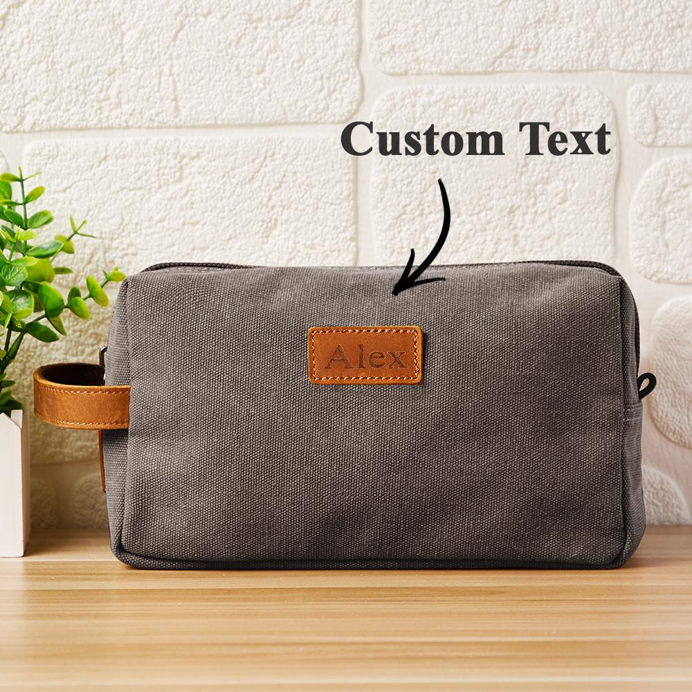 Sturdy zipper and reinforced stitching on personalised canvas wash bag — travel-friendly engraved toiletry kit built to last
