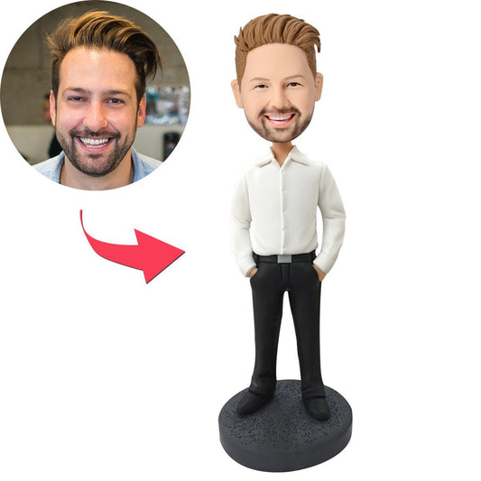 Slender business-casual personalised male bobblehead in polymer clay, front view showing customised head and engraved base - perfect corporate desk ornament and staff gift in the UK and Australia
