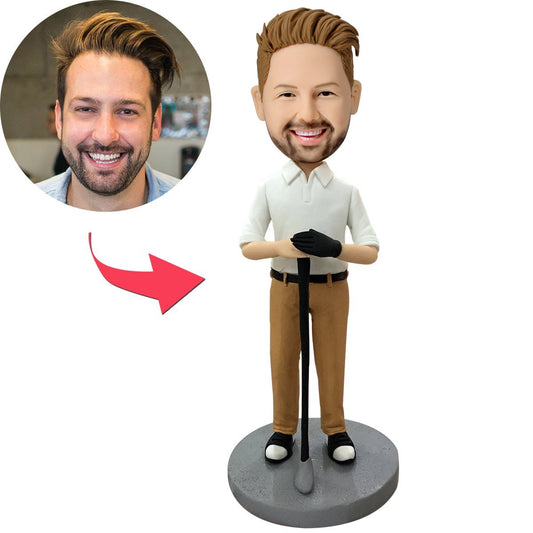 Personalised male golfer bobblehead — handcrafted polymer clay bobblehead with custom photo head and engraved name on base; ideal personalised golf gift