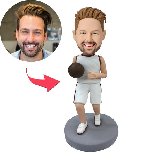 Personalised basketball player bobblehead dribbling in a white uniform — hand-sculpted polymer clay head customised from your photo with engraved text on the base