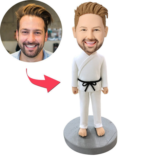 Personalised male martial arts bobblehead on engraved base — polymer clay figure with customised head, hairstyle and martial arts uniform