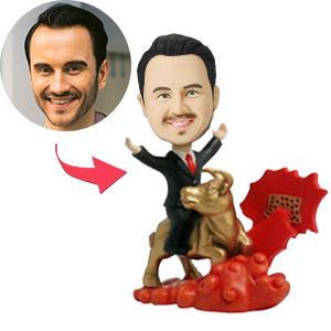 Personalised man riding golden bull bobblehead with engraved base - polymer clay custom head, gold-painted bull desk ornament ideal as a unique gift or corporate trophy