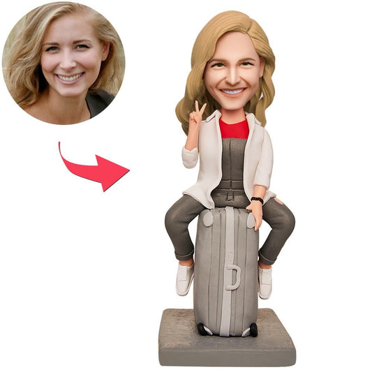 Suitcase Woman personalised bobblehead with engraved text on base – hand‑sculpted polymer clay female traveller with suitcase and custom head from your photo, perfect travel gift for her