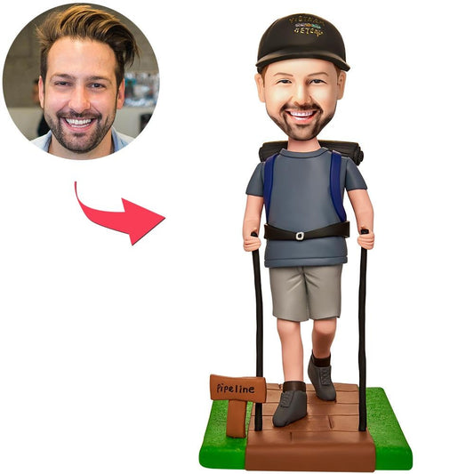 Male traveller personalised polymer clay custom bobblehead with engraved text on base — custom head modelled from your photo, travel-themed keepsake and perfect personalised gift