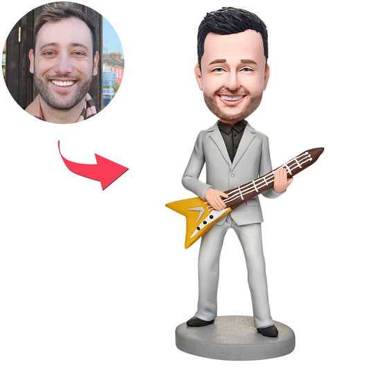 Personalised guitar player and singer bobblehead in polymer clay, holding a guitar and mic with engraved personalised text on the base – custom gift for guitarists and singers