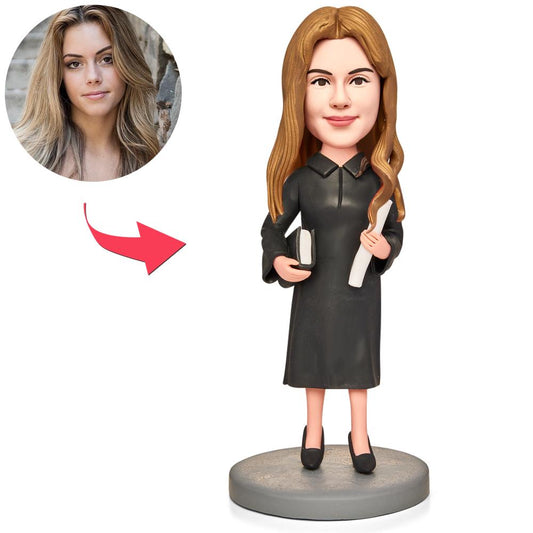 Personalised female professor bobblehead in polymer clay holding an engraved certificate and book – custom teacher gift and graduation keepsake