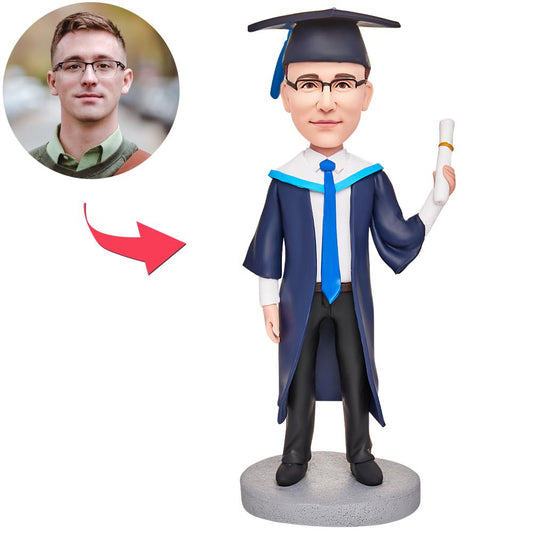 Personalised graduation bobblehead – cool boy holding certificate, custom head matching hairstyle and expression with engraved text option; polymer clay graduate gift for UK and Australia