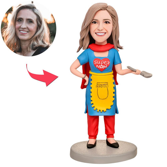 Personalised mother bobblehead in blue dress — hand-painted polymer clay figure with custom head made from your photo and optional engraved text on the base