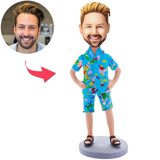 Personalised polymer clay bobblehead in Hawaiian outfit with engraved text on base — custom head made from your photo, fixed or moveable bobble option