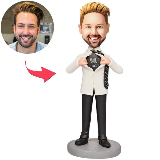 Personalised white business man bobblehead in suit with customised clay head and engraved text on the base, polymer clay office desk gift