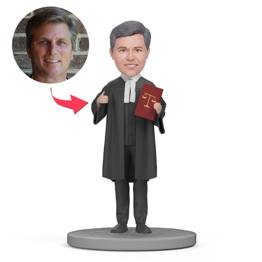 Personalised lawyer bobblehead in black robe with engraved base — custom head made from your photo on a bespoke polymer clay figure, ideal personalised lawyer gift for solicitors, barristers and law graduates