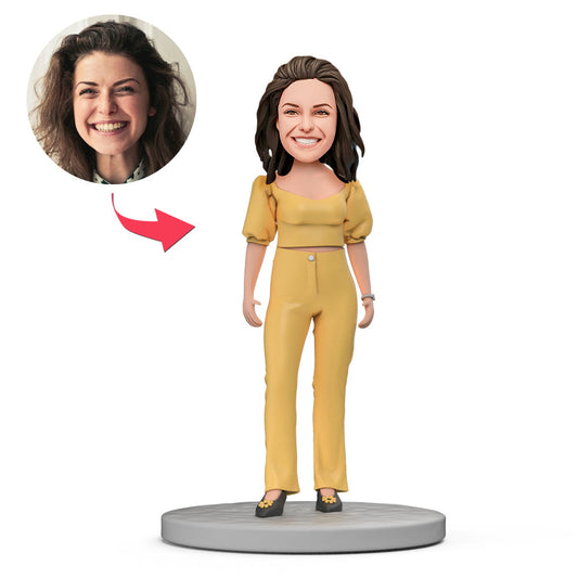 Personalised polymer-clay female boss bobblehead in a yellow suit with engraved base; customisable head portrait — ideal executive gift for her (UK & Australia)