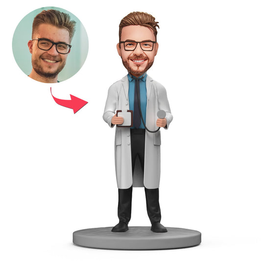 Personalised male doctor bobblehead with stethoscope and medical record — bespoke bobble head handmade in polymer clay with a custom face from your photo and engraved text; ideal GP gift, NHS doctor gift and clinic desk ornament