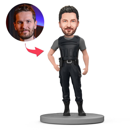 Personalised police officer bobblehead in bullet-proof vest, custom face sculpted from your photo with engraved name, date or badge number on the base — handmade premium polymer clay keepsake