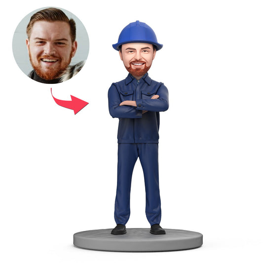 Custom mechanical engineer bobblehead in blue overalls with personalised head and engraved base — handmade polymer clay model, ideal personalised engineer gift in the UK and Australia