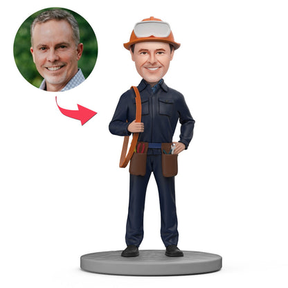 Personalised mechanical engineer bobblehead with cables and kits — handcrafted polymer clay figurine with custom sculpted head and optional engraved text, perfect personalised desk ornament gift