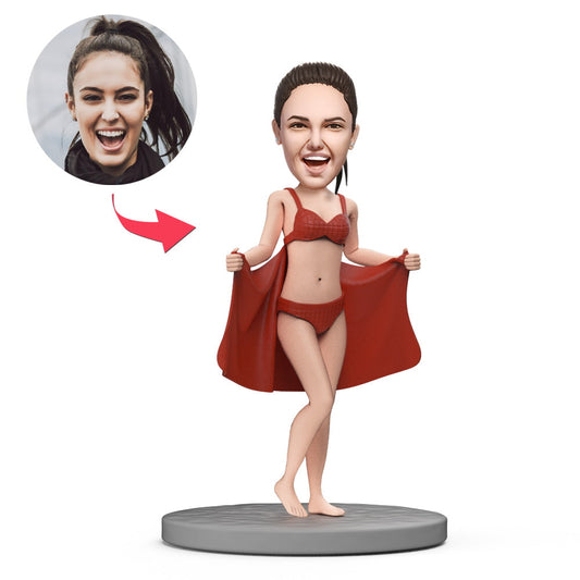 Personalised humorous sexy female stripper bobblehead — custom head likeness, polymer clay detail and engraved text on base, front view on white background